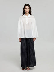 Wide-Leg Smocked-Waist Pinstripe Trousers